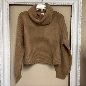 Elan cableknit sweater